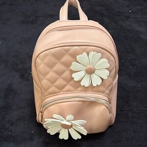 Chic Quilted Pink Backpack with Floral Accents